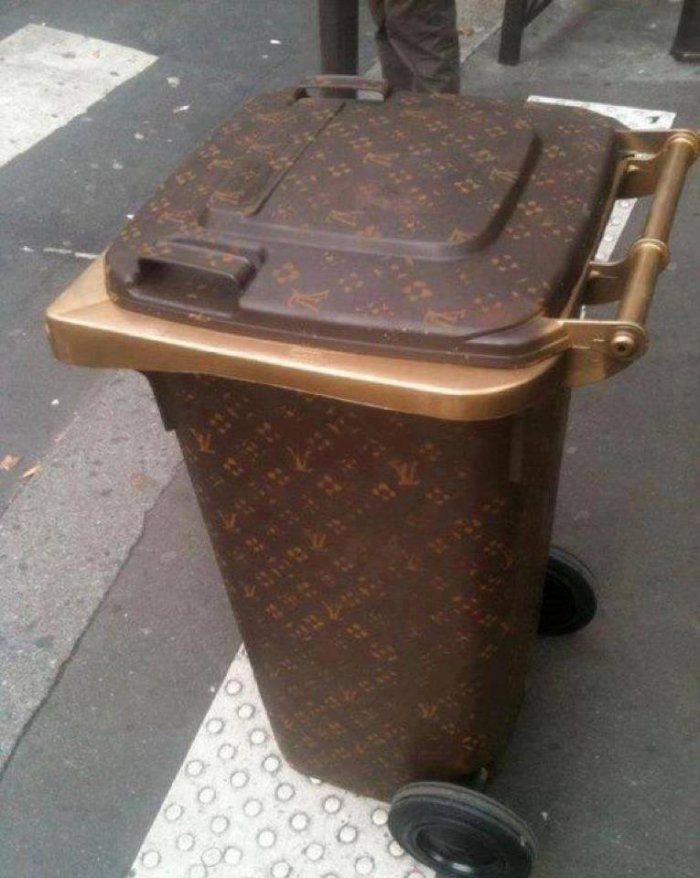 LOUIS VUITTON AND GUCCI BAGS IN THE GARBAGE BIN 